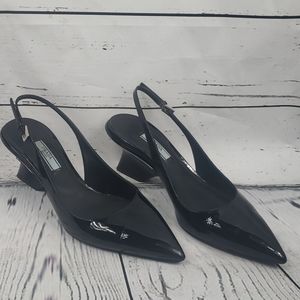 Patent leather slingbacks by Prada Milano